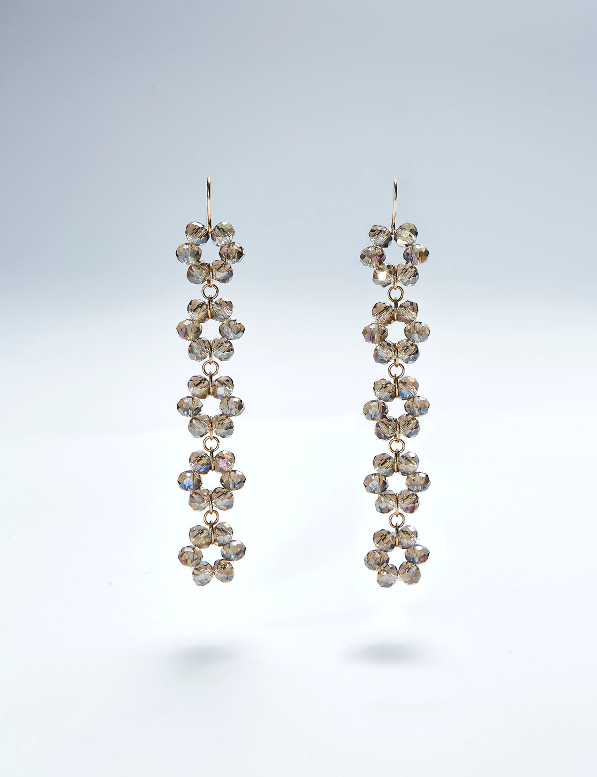 Daisy Chain beaded earrings in glass beads, shown in several colours